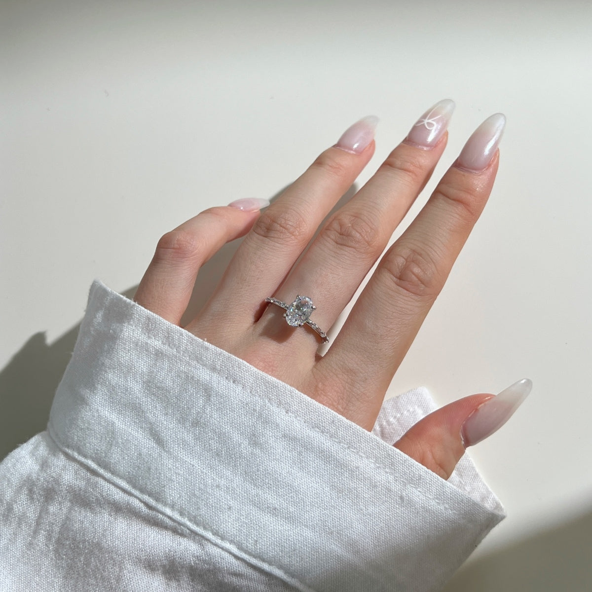 Oval white ring